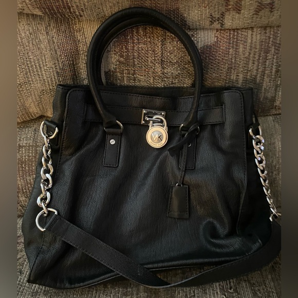 Michael Kors Handbags - Michael Kors Black tote with Silver Hardware.